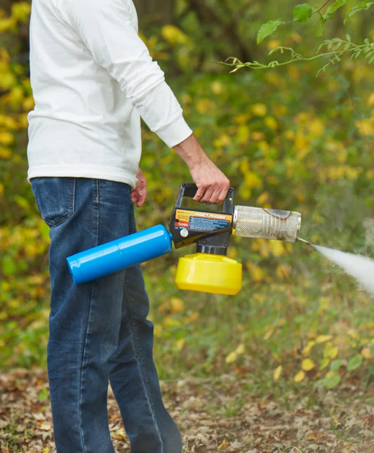 Burgess propane insect fogger fogging a backyard