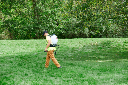 Field King Max Pro backpack sprayer in use on a lawn