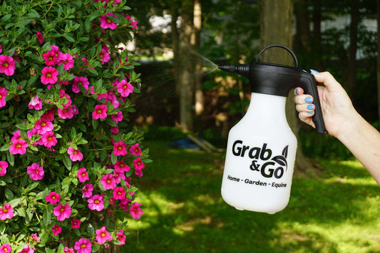 Grab & Go handheld sprayer misting flowers