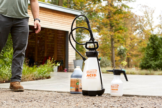 Smith Performance acid sprayer on a driveway