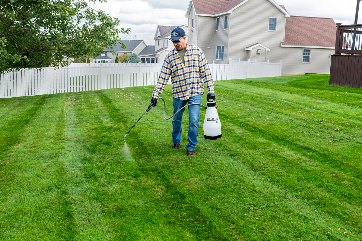 Smith Multi-Use 3 Gallon sprayer treating a lawn