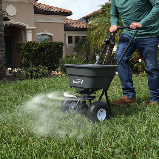 Smith SB-65 broadcast spreader on a lawn